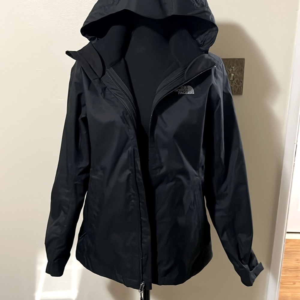 The North Face Jacket with a removable fleece liner inside.